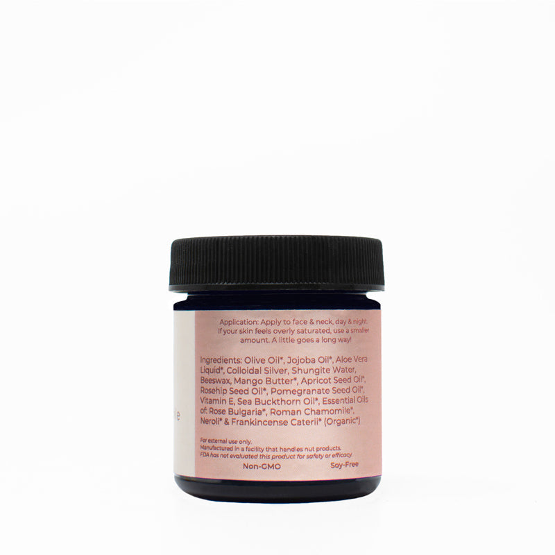 rose & chamomile luxury facial cream with smooth texture and golden color